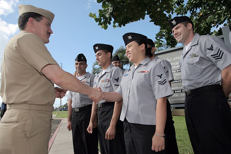 800px-US_Navy_050225-N-3228G-001_Master_Chief_Petty_Officer_of_the_Navy_%28MCPON%29_Terry_Scott_meets_several_Task_Force_Uniform_volunteers.jpg