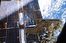 Cosmonaut Sergey Volkov works outside the International Space Station on August 3, 2011. Volkov during Russian EVA28.jpg