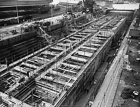 Phoenix caissons under construction in Southampton in 1944 Construction of Mulberry Harbours, Southampton, April 1944 A25792.jpg