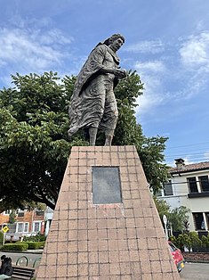 Fotografía tomada desde el sur. En esta se puede apreciar una vista oblicua del monumetno a Giordano Bruno y su respectica placa descriptiva.