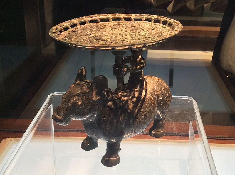 File:Shanxi Museum - bronze ox with a man standing on the back and holding a plate.JPG