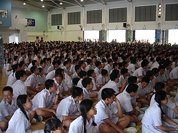 Schoolers gathered from the Nan Hua High School in Singapore Students of Nan Hua High School, Singapore, in the school hall - 20060127.jpg