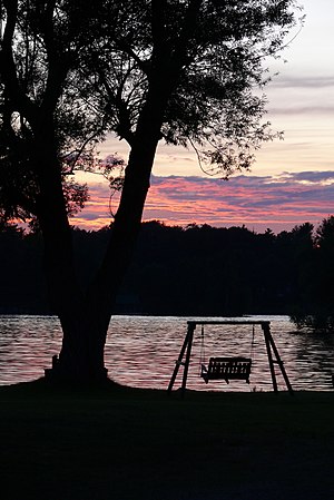 English: Porch swing at sunset along the Saint...