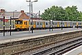 A Merseyrail Class 508 pulls into the stabling siding platforms at Rock Ferry.