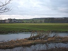 The site of the Roman fort at Watercrook across the River Kent Watercrook Farm and the River Kent.jpg