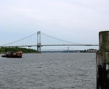 Bronx-Whitestone Bridge between the Bronx and Queens. The Throgs Neck Bridge, also between the Bronx and Queens, is visible in the background. Westchcreekjeh.JPG