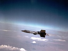 The North American X-15 in flight. X-15 flew above 100 km (62 mi) twice and both of the flights were piloted by Joe Walker (astronaut). X-15 flying.jpg