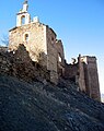 Vista postero-lateral derecha (suroriental) de la iglesia de San Bartolomé en Moya (Cuenca), con detalle de la espadaña.