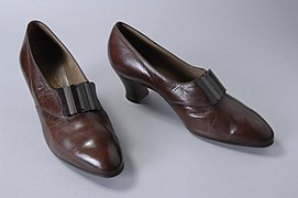 Brown leather shoes with decorative plastic buckle, c. 1930–1932.