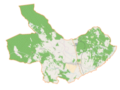 Mapa konturowa gminy Cmolas, po prawej znajduje się punkt z opisem „Poręby Dymarskie”