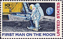 A 10 cent stamp, with the words "First man on the moon" and "United States" on it. The image on the stamp is a drawing of Armstrong stepping off of the lunar module