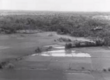 French plane pulling up after a dive to drop napalm bombs on Vietminh force ambushing a French battalion.