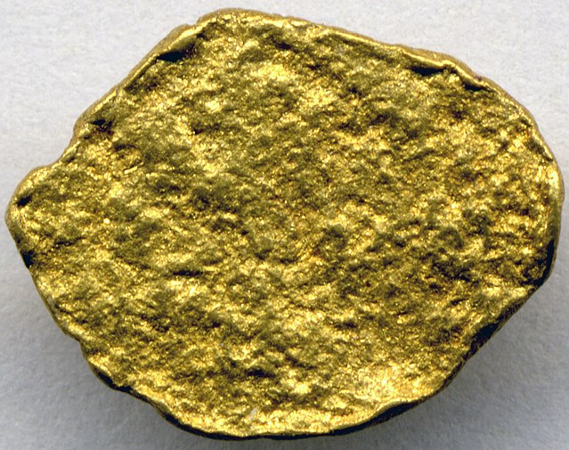 Gold nugget (placer gold) 1 (17001285916).jpg