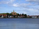 Kyrkan från en vik vid Kalundborg.