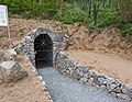 Restaurierter Stollenzugang zum historischen Silberbergwerk