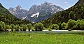 Image 10An alpine meadow in Julian Alps, with Prisojnik and Razor in the back