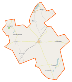 Mapa konturowa gminy Książki, w centrum znajduje się punkt z opisem „Kościół Świętej Trójcy w Książkach”