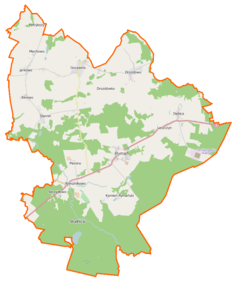 Mapa konturowa gminy Rymań, na dole nieco na lewo znajduje się owalna plamka nieco zaostrzona i wystająca na lewo w swoim dolnym rogu z opisem „Studnica”