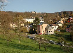 Dornach med ruinane av Dorneck slott i bakgrunnen