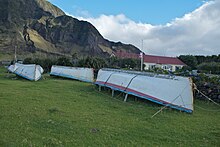 Longboats in front of the administrator's residence Tristan da Cunha - Longboats in front of the administrator's residence.jpg