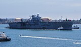 The decommissioned Tripoli being towed out of San Diego Bay