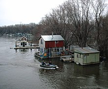 Community of boathouses on the Mississippi River in Winona, MN (2006) WinonaMNboathouses2006-05-09.JPG