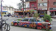 The Garden Car has been situated in Kensington Market since 2007, and is a public art piece that also doubles as a community garden. Art at Kensington Market.jpg