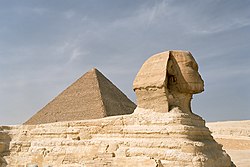 The Great Sphinx of Giza in front of the Great Pyramid of Giza Cairo, Gizeh, Sphinx and Pyramid of Khufu, Egypt, Oct 2004.jpg