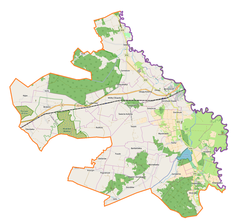 Mapa konturowa gminy Dorohusk, blisko centrum na prawo znajduje się punkt z opisem „Okopy”