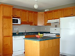 The wall cabinets in this kitchen have four different heights!