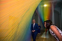 Michelle Obama viewing a sculpture in 2016. Michelle Obama and Sindre Finnes at Renwick Gallery.jpg