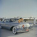 Queen Elizabeth and Prince Philip, are driven along the runway en route to Rideau Hall, Oct. 12, 1957. Ottawa, Ontario.jpg