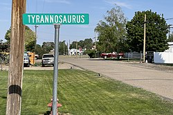 A sign for Tyrannosaurus Trail, a street in Dinosaur