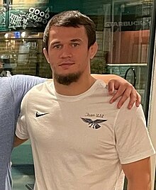 Photo of Usman Nurmagomedov in a white shirt