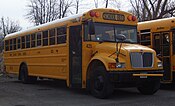 A 2003 IC CE conventional-style school bus owned by North Syracuse Central Schools.