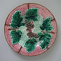 Boch Freres Kermis Plate, coloured glazes, c. 1880, grapes and vine leaves pattern.