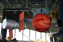 Model of the Hubble Space Telescope and Jupiter created by Charm City Cakes on display at the Goddard Space Flight Center in Greenbelt, Maryland Cake hubble.JPG