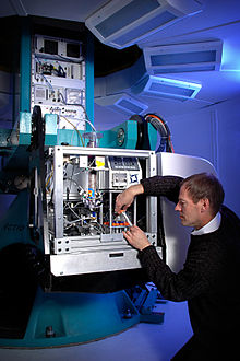 A scientist works on the large geocentrifuge of the Geocentrifuge Research Laboratory at the Idaho National Laboratory. Geocentrifuge.jpg