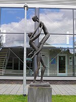 Sportende jongen en meisje (Hilversum, 1977)