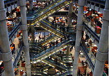 Interior escalators linking the underwriting floors of the Lloyd's building Inside Lloyd's of London.jpg