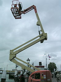 Articulated lift being demonstrated.