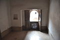 Interior view of student cell looking out over the central courtyard.