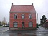 Vrijstaande dorpswoning op de hoek met het Nellekenshof