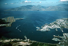 Naval Air Station Cubi Point left, U.S. Naval Base Subic Bay right. Seabees leveled a mountain that civilian contractors said could not be done. (USN) NAS Cubi Point and NS Subic Bay.jpg