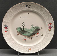 Plate with Green Landscape, c. 1778, Frankenthal, hard-paste porcelain, using Meissen's "Neuozier relief decoration on the lip.