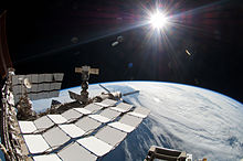The Sun, as seen from low Earth orbit overlooking the International Space Station. This sunlight is not filtered by the lower atmosphere, which blocks much of the solar spectrum. STS-134 EVA4 view to the Russian Orbital Segment.jpg