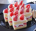 A slice of strawberry cakes in buffet