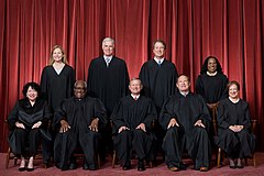 The Roberts Court (since June 2022): Front row (left to right): Sonia Sotomayor, Clarence Thomas, Chief Justice John Roberts, Samuel Alito, and Elena Kagan. Back row (left to right): Amy Coney Barrett, Neil Gorsuch, Brett Kavanaugh, and Ketanji Brown Jackson. Supreme Court of the United States - Roberts Court 2022.jpg