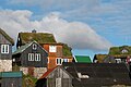 Image 5Traditional Faroese houses with turf roof in Reyni, Tórshavn. Most people build larger houses now and with other types of roofs, but the turf roof is still popular in some places. (from Culture of the Faroe Islands)
