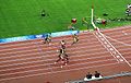 O jamaicano Usain Bolt conquistando a medalha de ouro nos Jogos Olímpicos de 2008: um exemplo de superação pessoal, tema este que passou a ser explorado pela banda a partir de 2002
